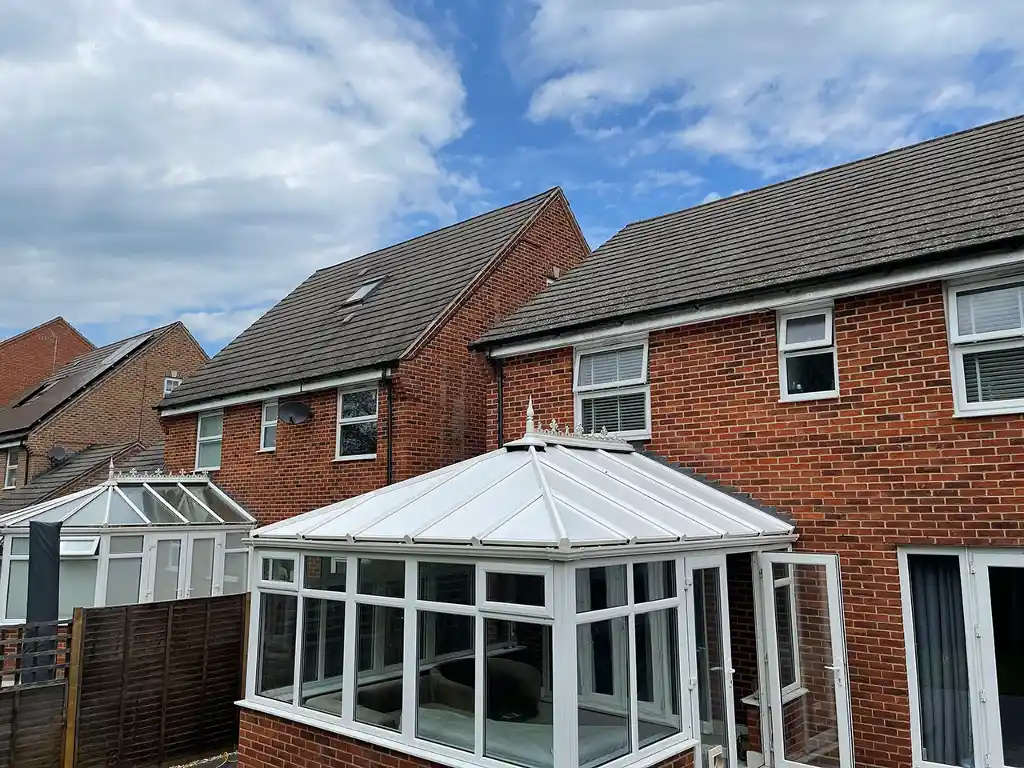 Outside shot of new insulated roof panels on a conservatory roof